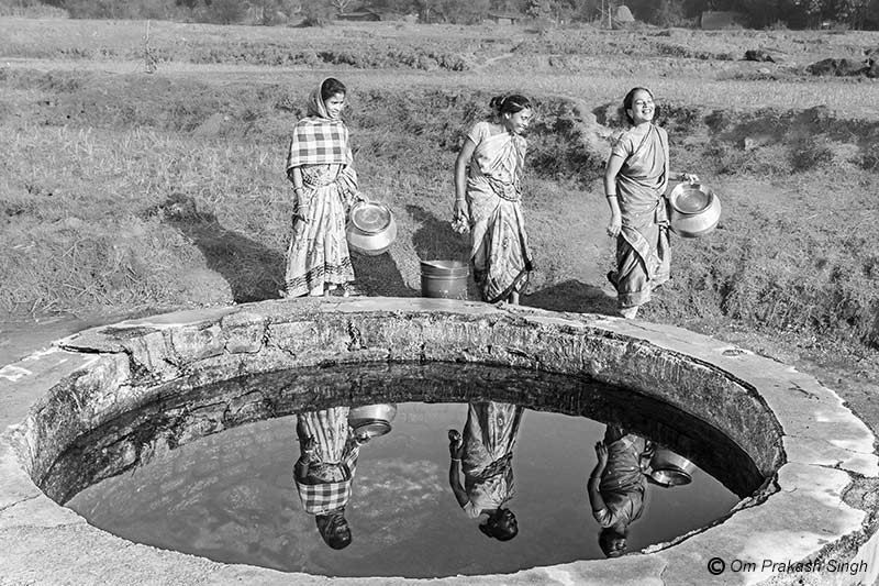 Women from different communities sharing joyous moments at the Paata Daarhi of Kudda village, Jharkhand, India